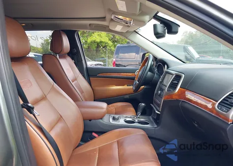 2013 Jeep Grand Cherokee Overland z USA, uszkodzony, nr VIN 1C4RJFCG6DC611798